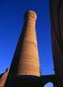 The Kalyan minaret or Minâra-i Kalân (Pesian/Tajik for the 'Grand Minaret') is part of the Po-i-Kalyan mosque complex and was designed by Bako and built by the Qarakhanid ruler Arslan Khan in 1127.<br/><br/>

The minaret is made in the form of a circular-pillar brick tower, narrowing upwards, with a diameter of 9m (30ft) at the bottom, 6m (20ft) at the top and a height of 46m (150ft) high.<br/><br/>

The Kalyan Minaret is also known as the 'Tower of Death', as for centuries criminals were executed by being tossed off the top.<br/><br/>

Bukhara was founded in 500 BCE in the area now called the Ark. However, the Bukhara oasis had been inhabitated long before.<br/><br/>

The city has been one of the main centres of Persian civilization from its early days in 6th century BCE. From the 6th century CE, Turkic speakers gradually moved in.<br/><br/>

Bukhara's architecture and archaeological sites form one of the pillars of Central Asian history and art. The region of Bukhara was for a long period a part of the Persian Empire. The origin of its inhabitants goes back to the period of Aryan immigration into the region.